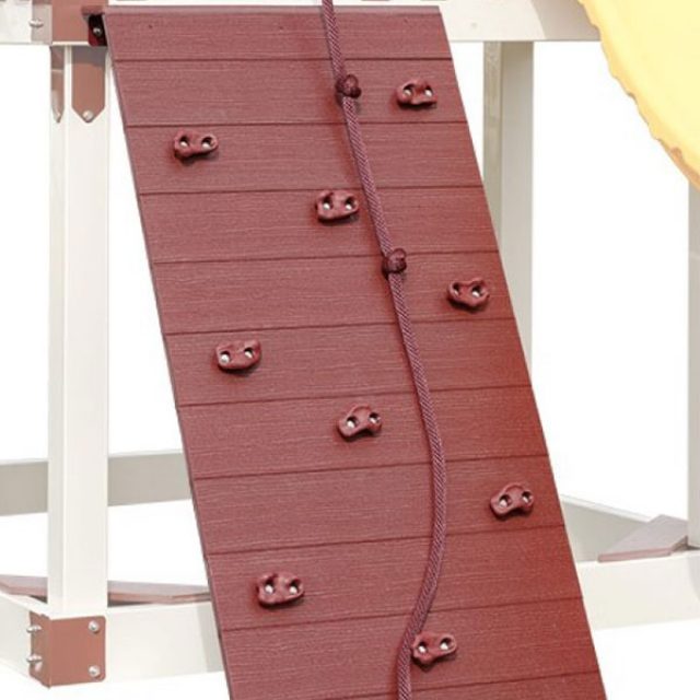 mini rock wall on swing set for children six years and older