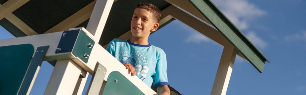 healthy child on swing set