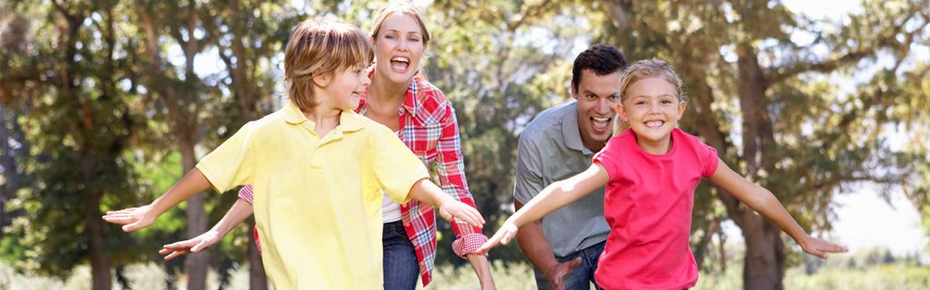 parents playing outside with kids