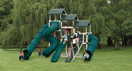 huge fantasy fortress playground with four high-speed slides and three tall towers huge fantasy fortress backyard playground