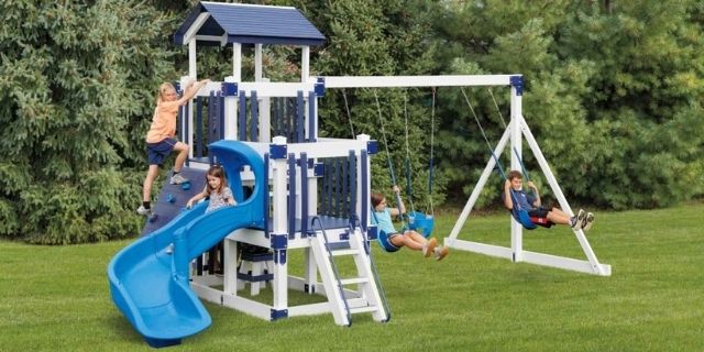 Kids playing on Discovery Depot double tower playset Children having fun on Discovery Depot double tower playset