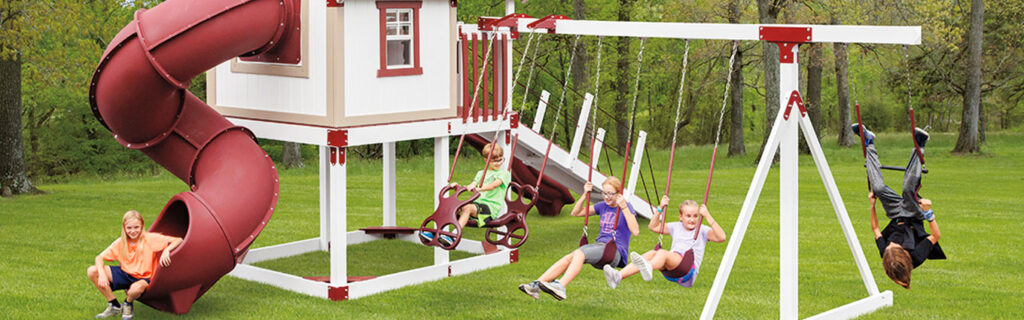 kids playing on a swingset